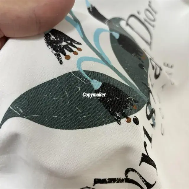 【現貨】D1OR 25FW Couture 開裂小破壞 胸前字母logo 背後鈴蘭花 短袖T恤 黑色/白色