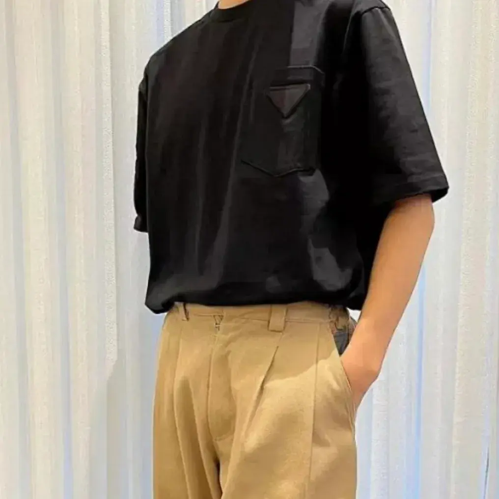 PRA 24SS Ripped-Triangle 三角標貼布 水洗 簡約素色 短袖T恤